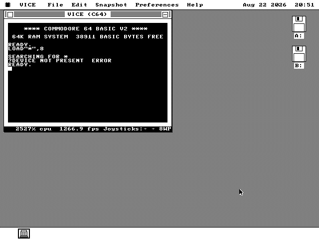 The Commodore 64 window showing LOAD quote star quote comma 8 typed at the prompt, then SEARCHING FOR star, then question mark DEVICE NOT PRESENT ERROR, then READY.