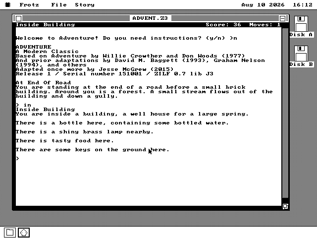 A window titled ADVENT.Z3. The status line reads Inside Building, Score: 36, Moves: 1. The text below begins Welcome to Adventure! Do you need instructions? answered with n, then a credits block naming Willie Crowther and Don Woods 1977, then the description of the end of a road before a small brick building, the typed command in, and a list of what is inside: a bottle of water, a shiny brass lamp, tasty food and some keys.