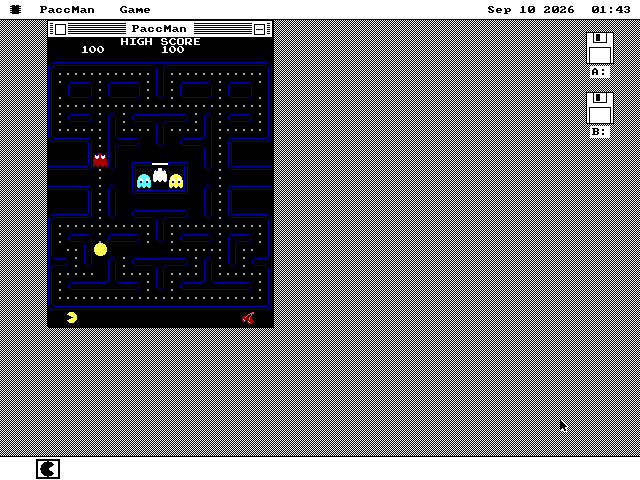 The PaccMan window showing a round in progress: the tall blue Namco maze full of dots, Pac-Man in the lower left, three ghosts inside the ghost house and a red ghost out above it. The score reads 100.