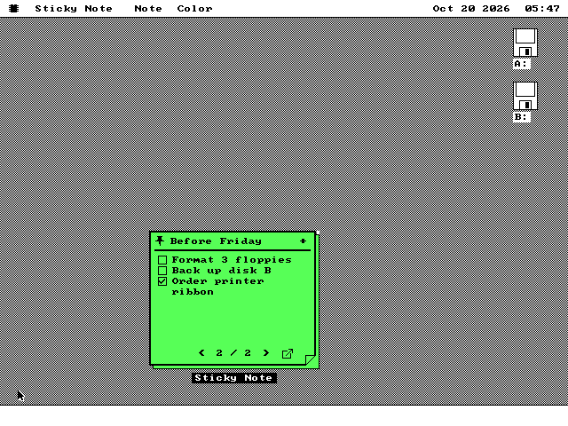 The same note on the desktop, now on green paper. Its title reads Before Friday, with a pin at the left and a plus at the right. Below are three check boxes: Format 3 floppies, Back up disk B, and Order printer ribbon, which is ticked. Along the bottom are arrows either side of 2 / 2 and an open-in-editor arrow.
