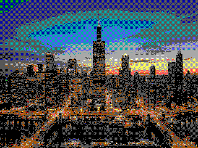 The same skyline drawn on the 640 by 480 VGA desktop in sixteen colours: the sky is bands of dotted blue and green, and the city is a speckle of orange, red and grey dots.