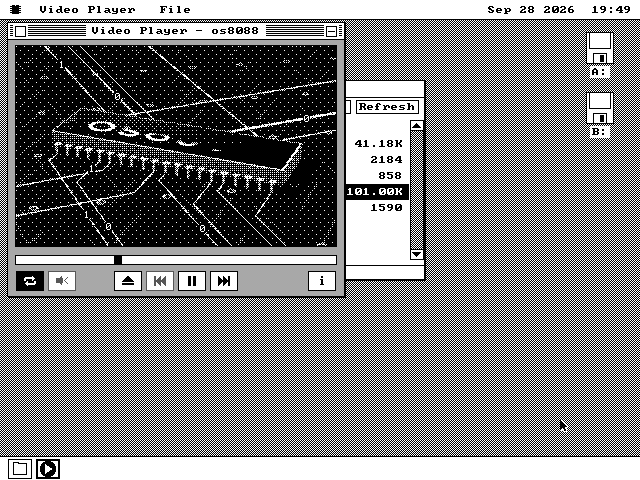 The Video Player window playing, with the scrub bar's thumb a third of the way along and a Pause button showing. On the chip the first letters of os8088 are appearing.